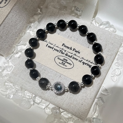 Aqua Fortune Guardian – Black Obsidian & Rutilated Quartz Bracelet with Aquamarine Center