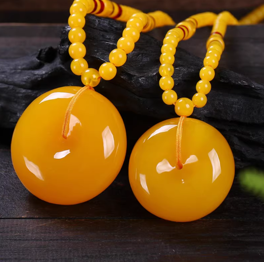 Guardian of Earth – Baltic Golden Beeswax Amber Peace Knot Pendant Necklace