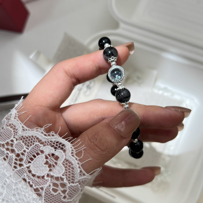 Aqua Fortune Guardian – Black Obsidian & Rutilated Quartz Bracelet with Aquamarine Center