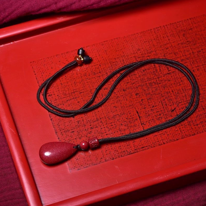 Cinnabar Teardrop Pendant: The Fire of Protection, The Flow of Fortune