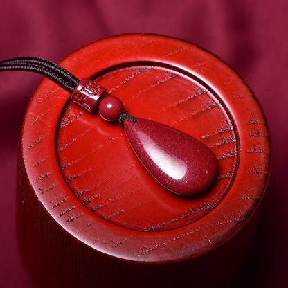 Cinnabar Teardrop Pendant: The Fire of Protection, The Flow of Fortune
