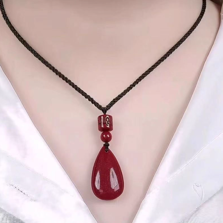 Cinnabar Teardrop Pendant: The Fire of Protection, The Flow of Fortune