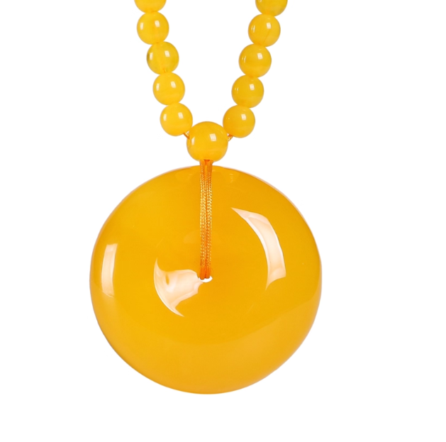 Guardian of Earth – Baltic Golden Beeswax Amber Peace Knot Pendant Necklace