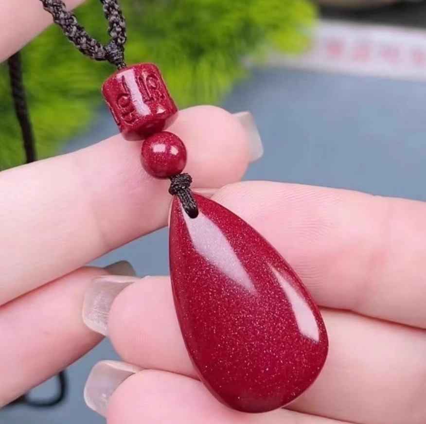 Cinnabar Teardrop Pendant: The Fire of Protection, The Flow of Fortune